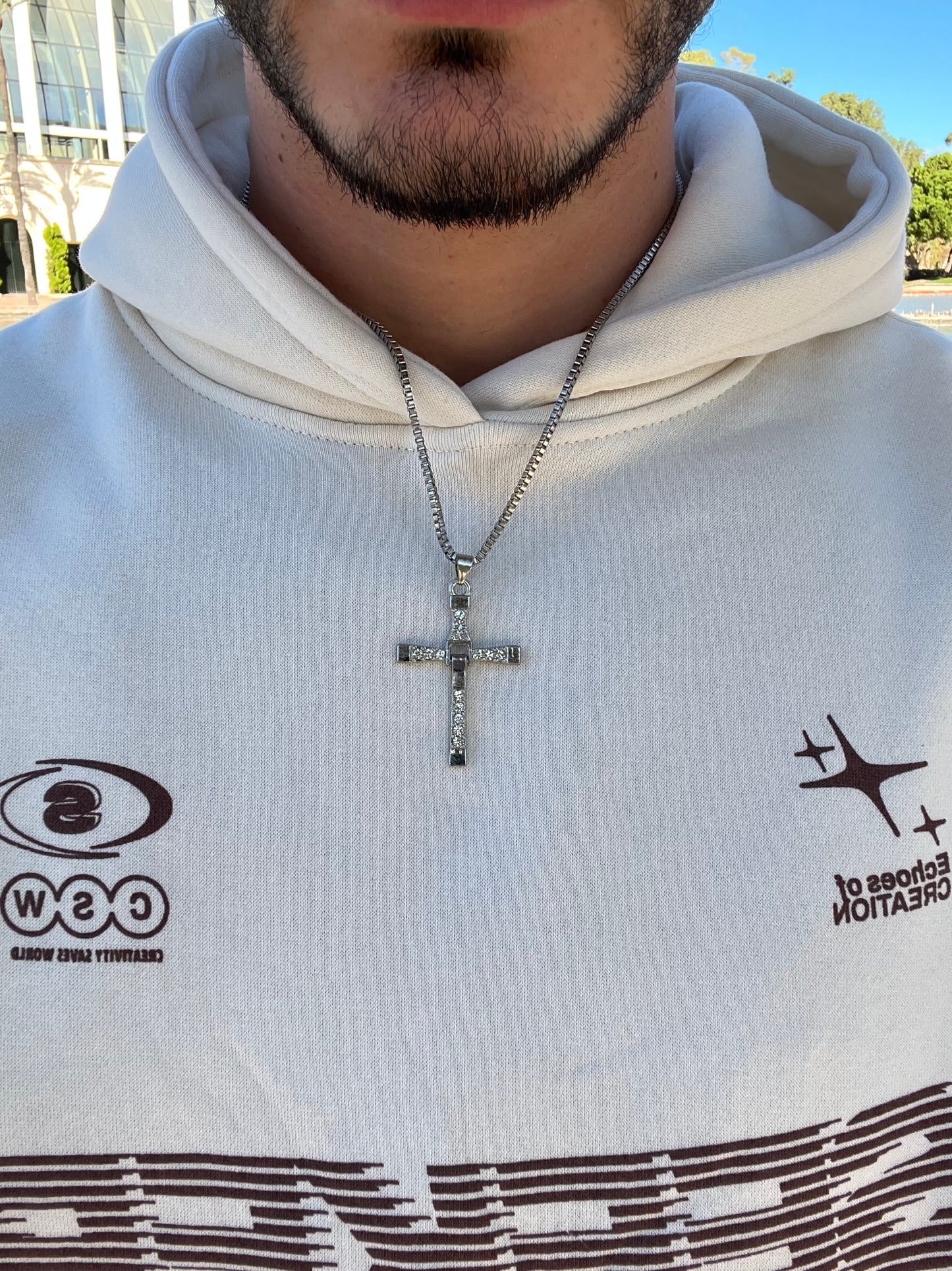 Cross necklace with inlaid stones